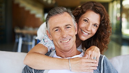 Older man and woman smiling