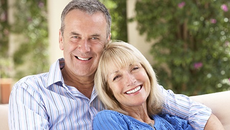 Older man and woman smiling