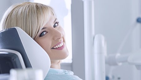 Smiling woman in dental chair